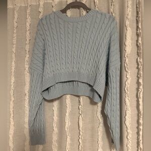 Blue cable knit sweater